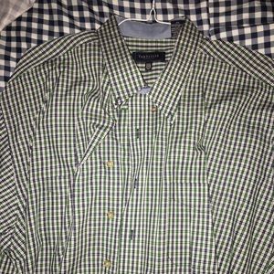 Plaid button down shirt.